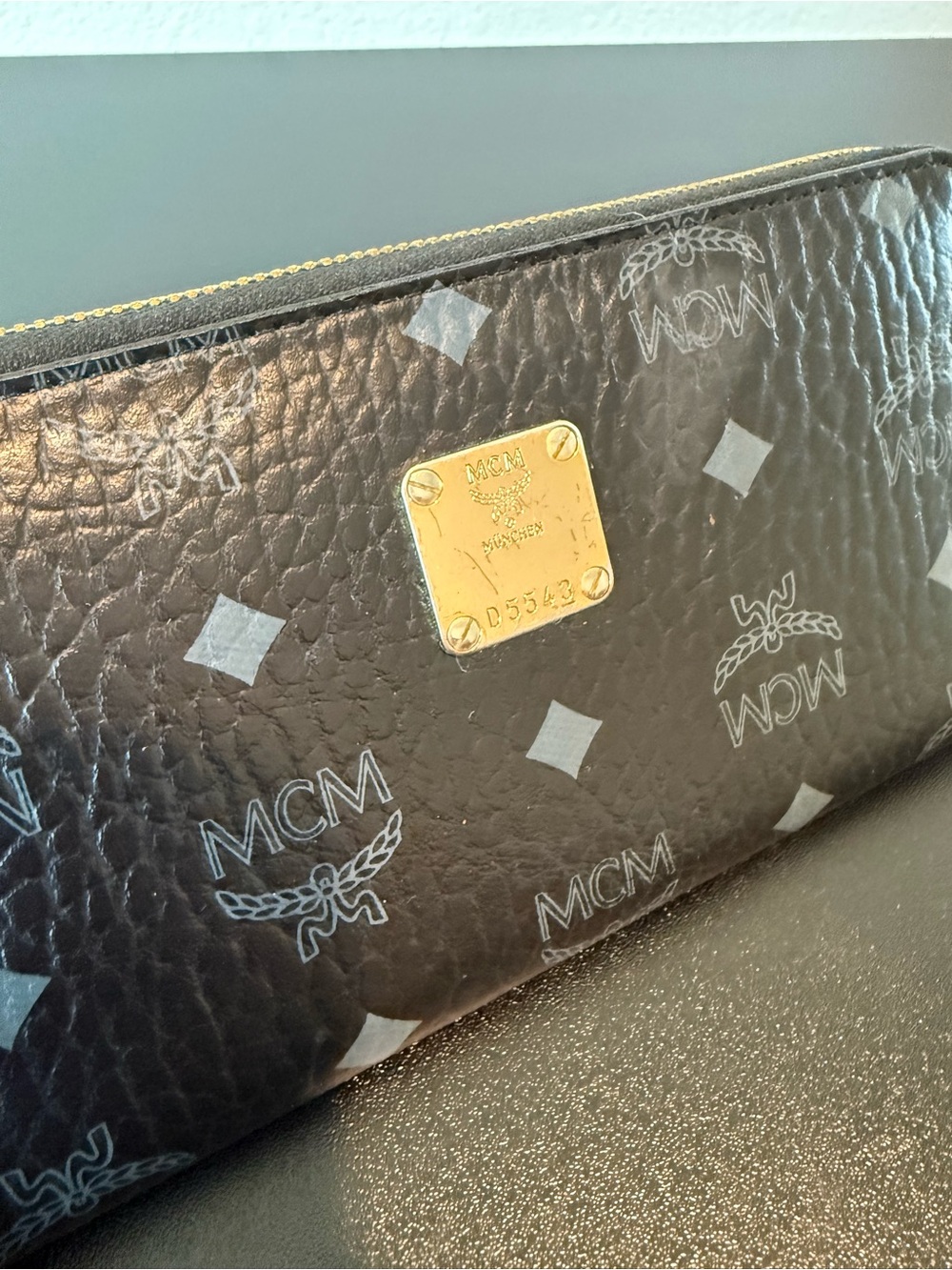 MCM Black Monogram Zip Pouch with Gold Plaque